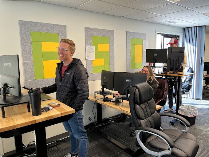 Picture of some team members working in the Cloudbaseway office
